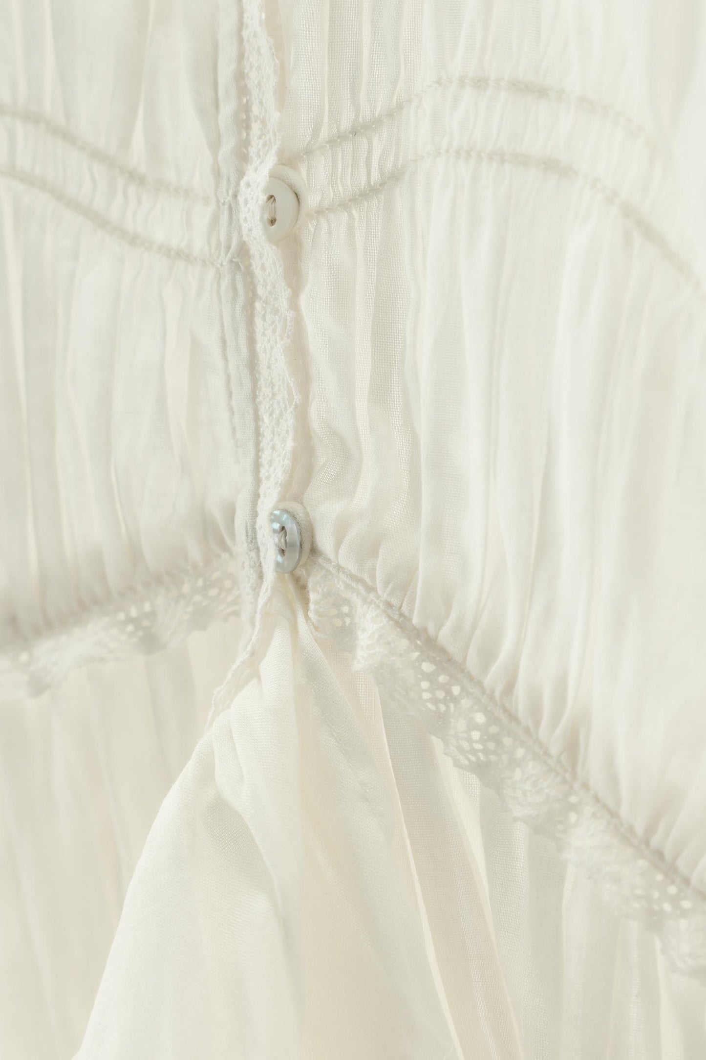 ASYMMETRIC TEXTURED BLOUSE LIMITED EDITION