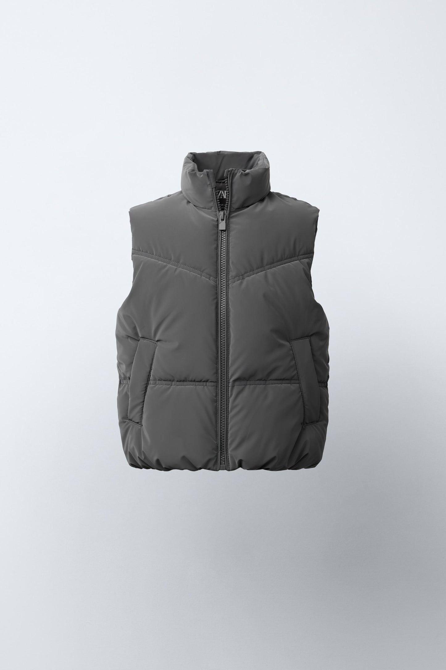 RUBBERIZED VEST