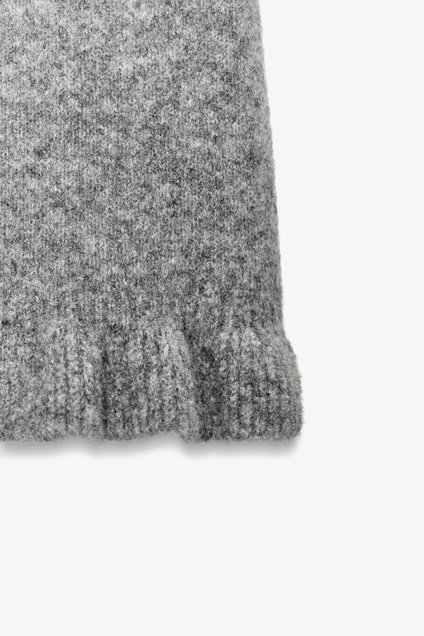 RUFFLED SHORT SLEEVE KNIT SWEATER