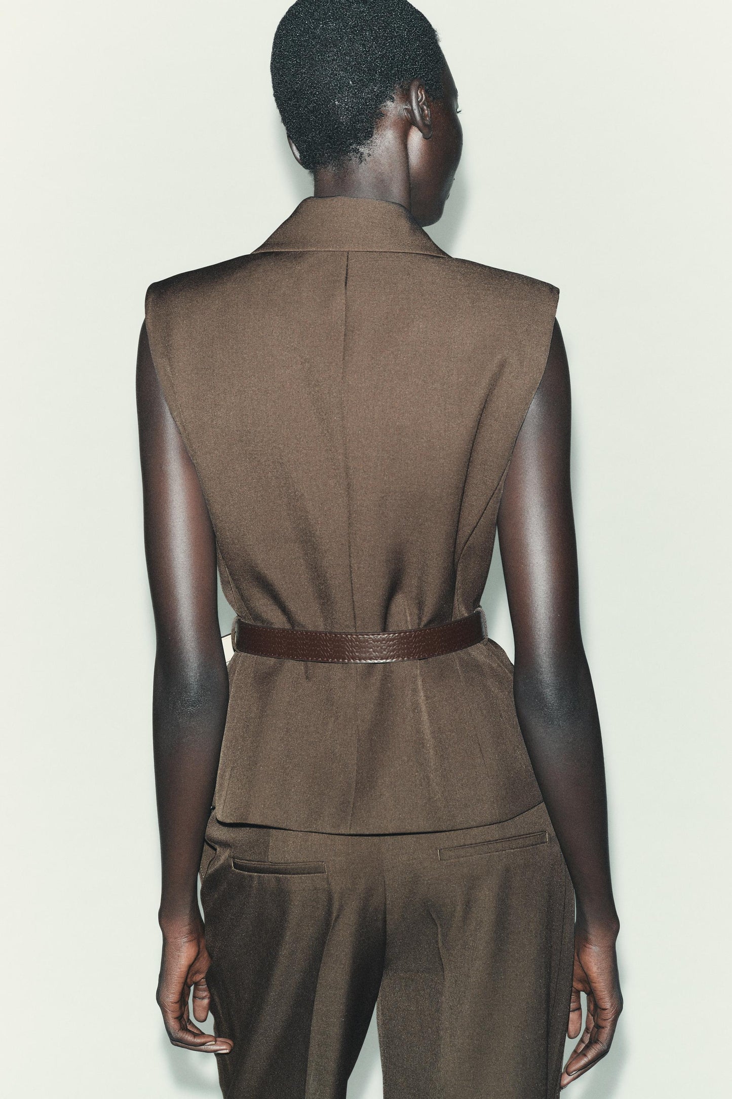 BELTED VEST