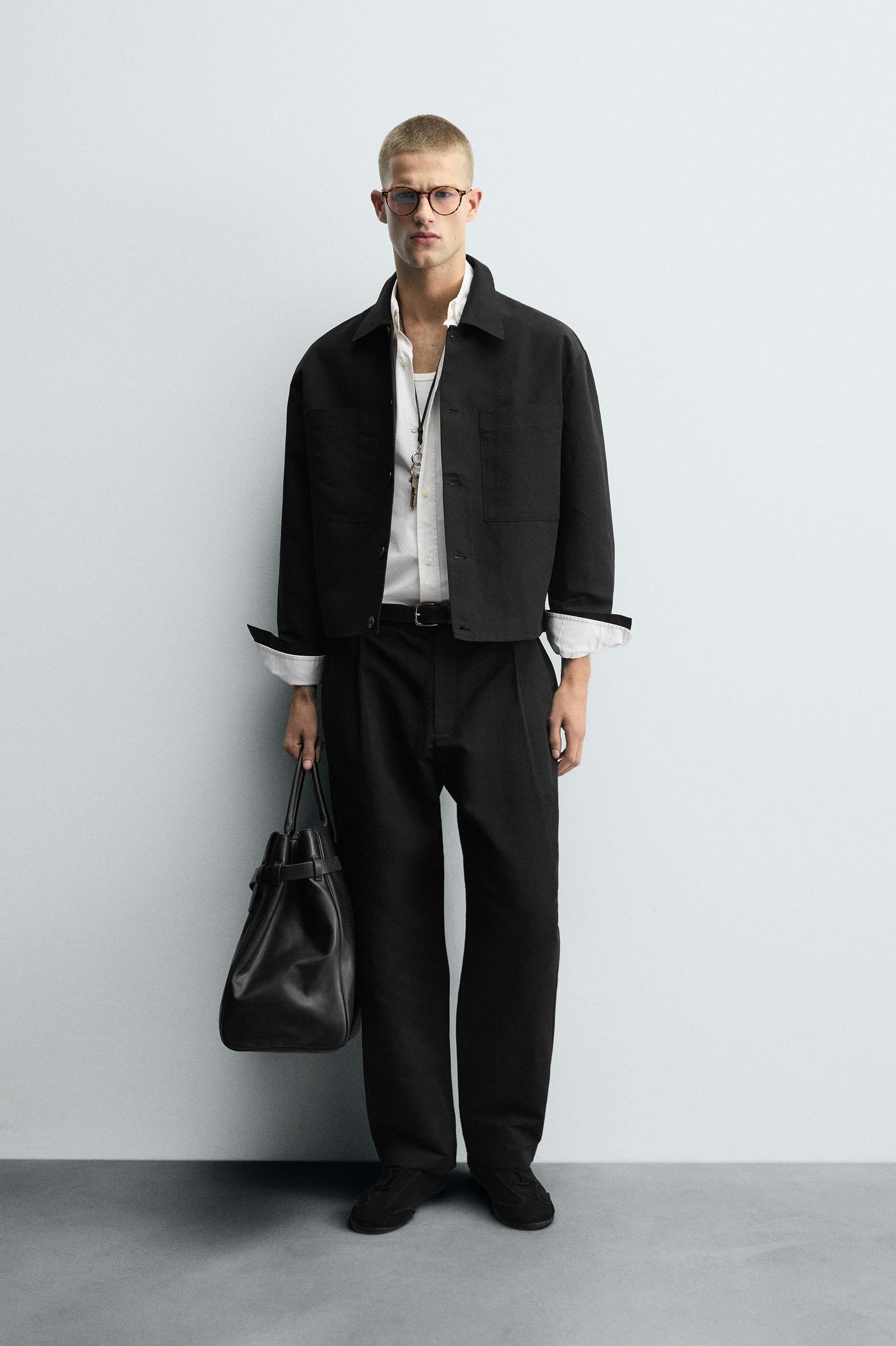 RELAXED FIT PLEATED PANTS