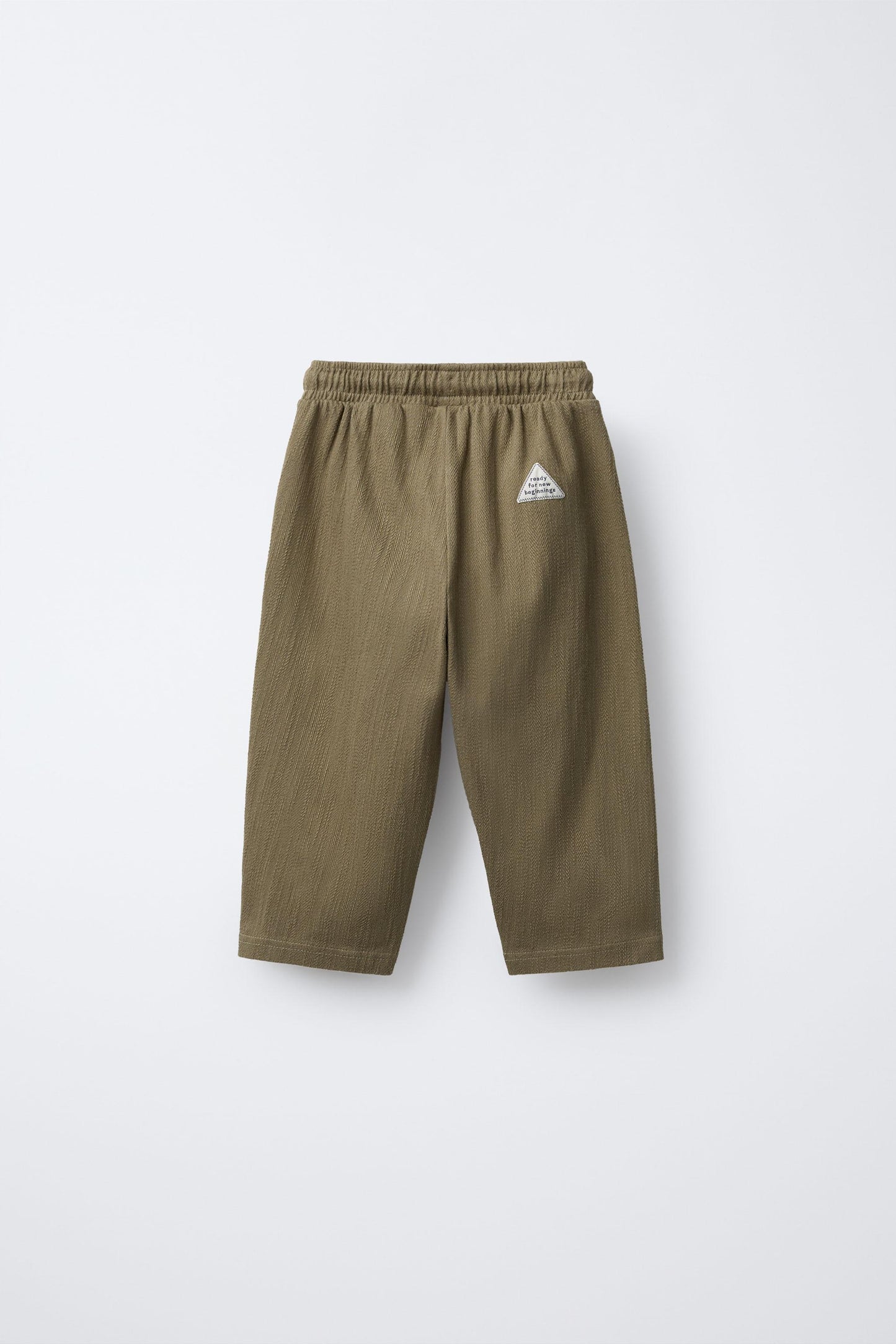 TEXTURED PANTS WITH LABEL
