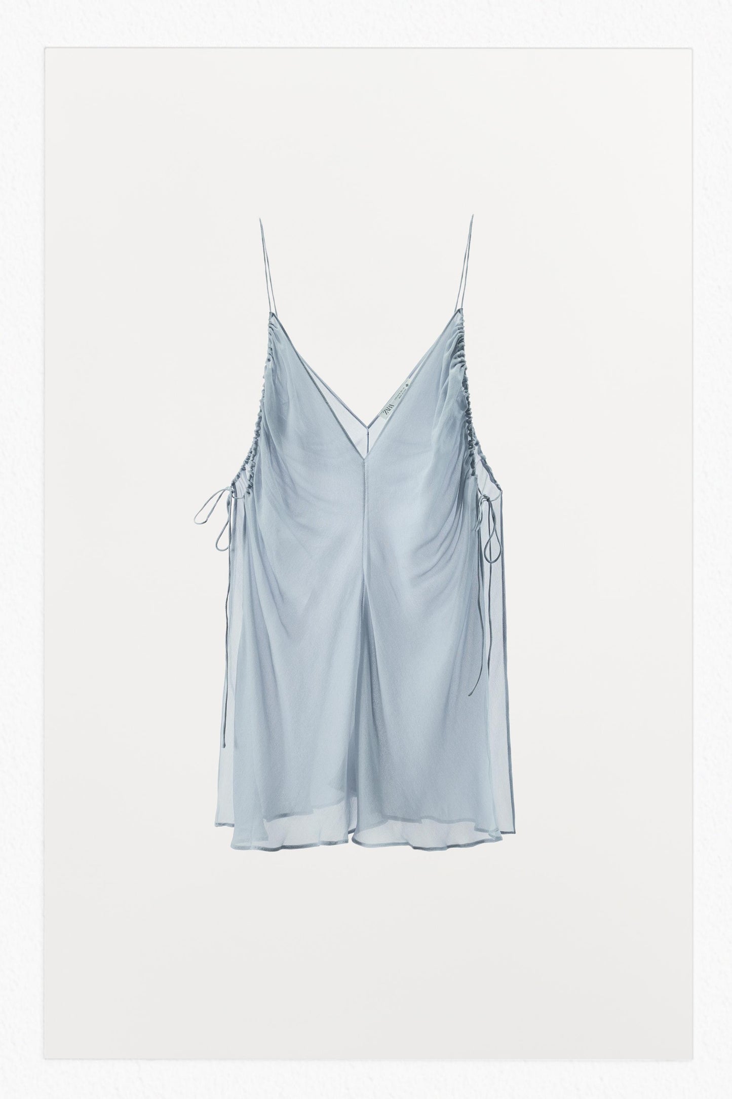 SEMI-SHEER DRAPED TOP