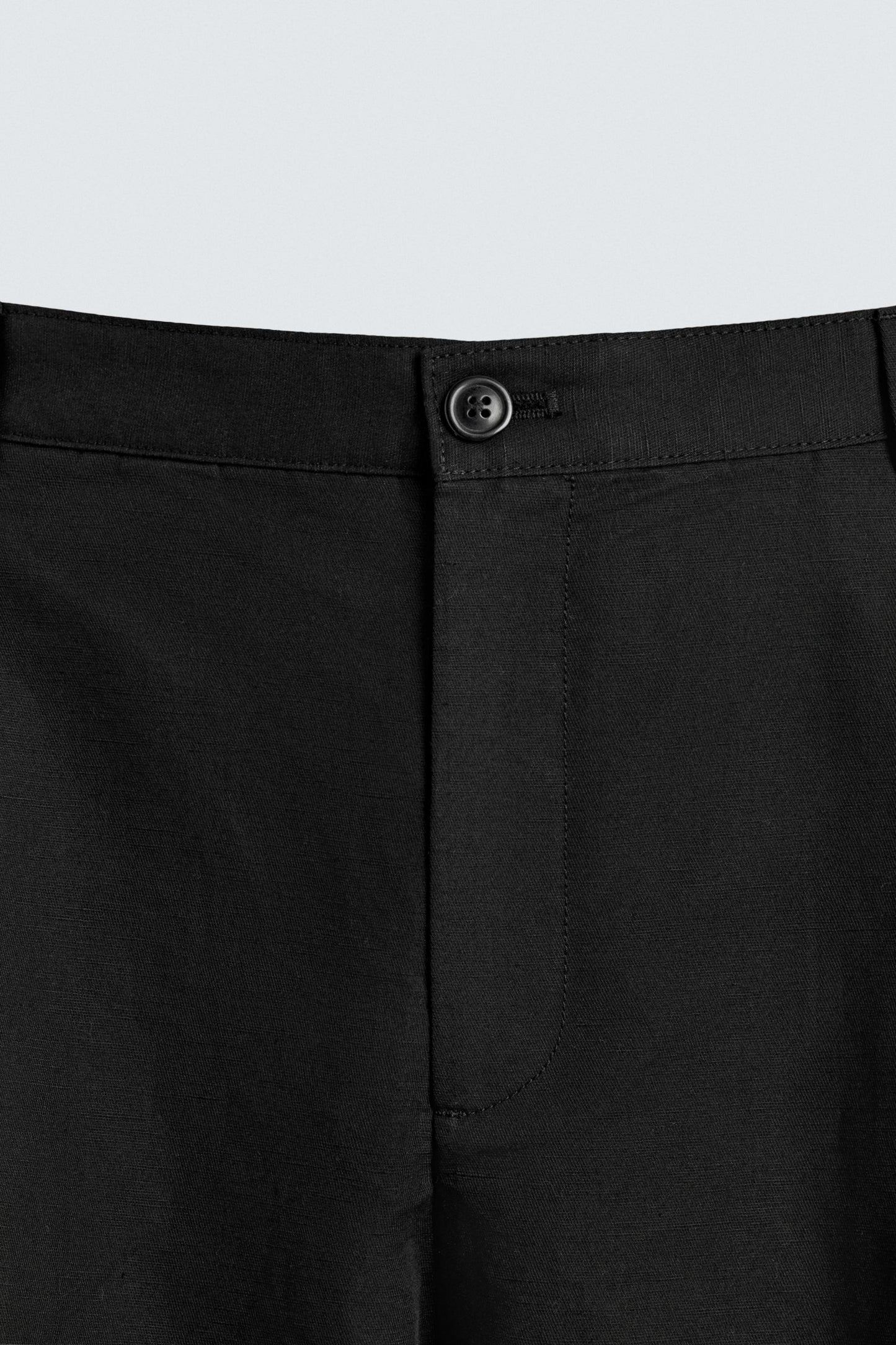 RELAXED FIT PLEATED PANTS