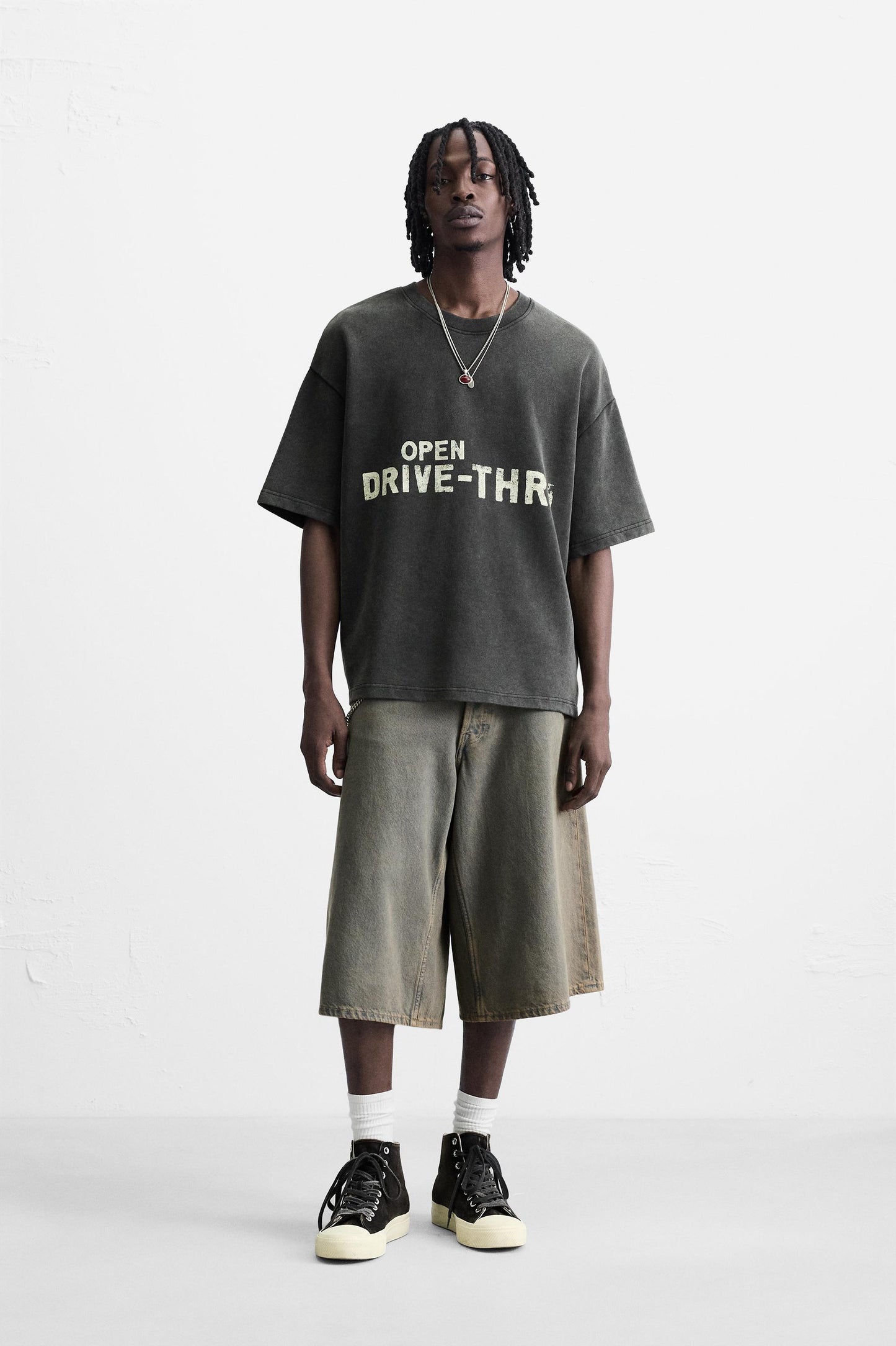 WASHED SWEATSHIRT WITH GRAPHIC PRINTS