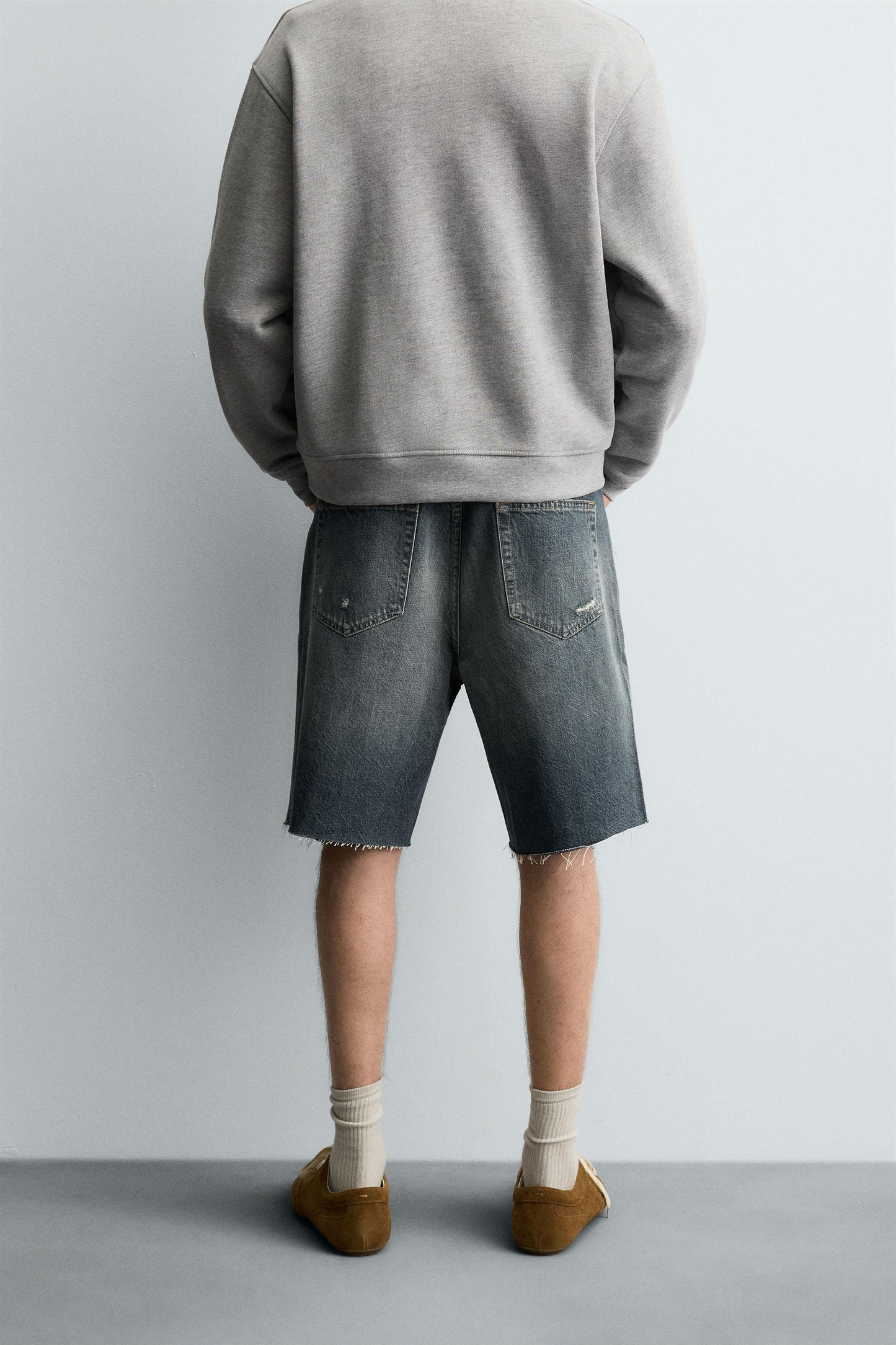 RIPPED DENIM BERMUDA SHORTS