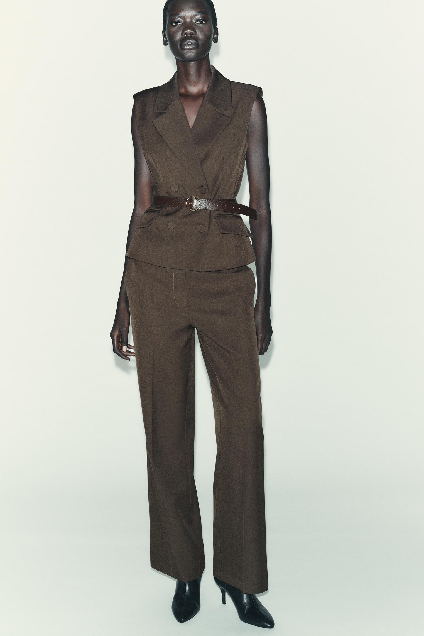 BELTED VEST