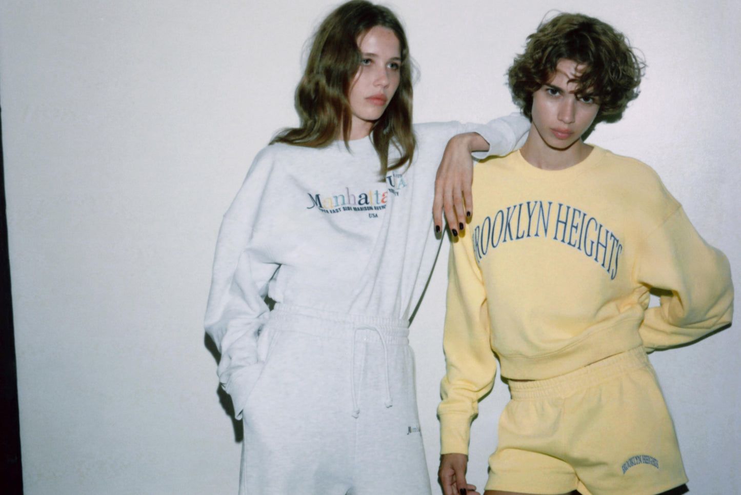 EMBROIDERED TEXT FLEECE SHORTS