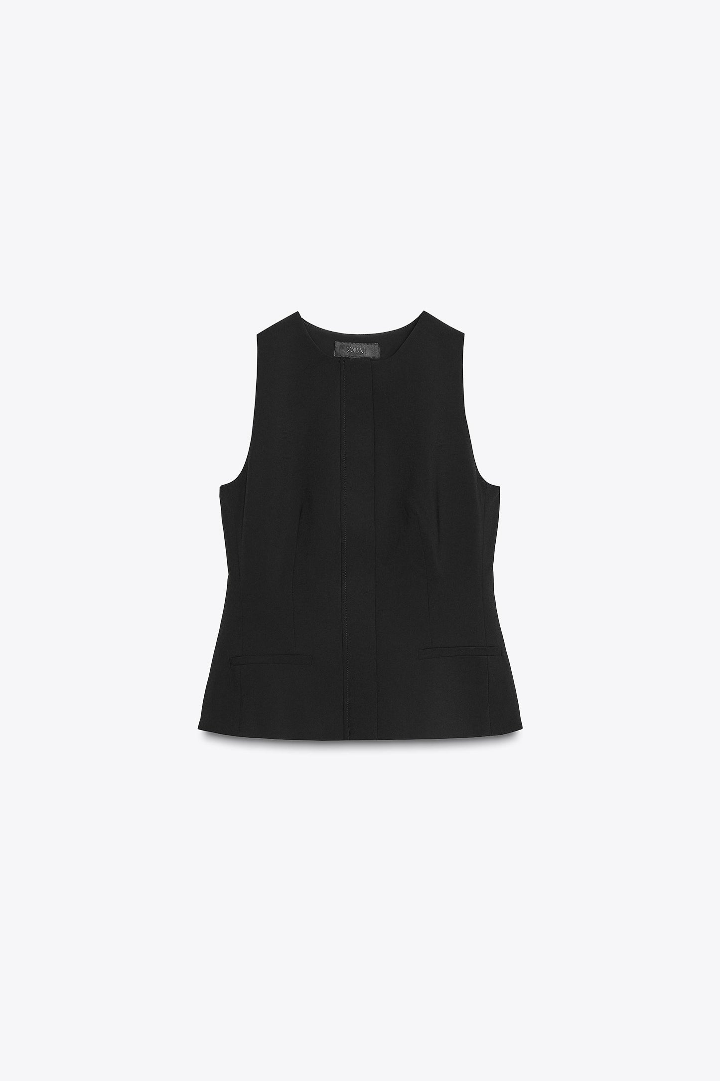 FITTED PEPLUM VEST