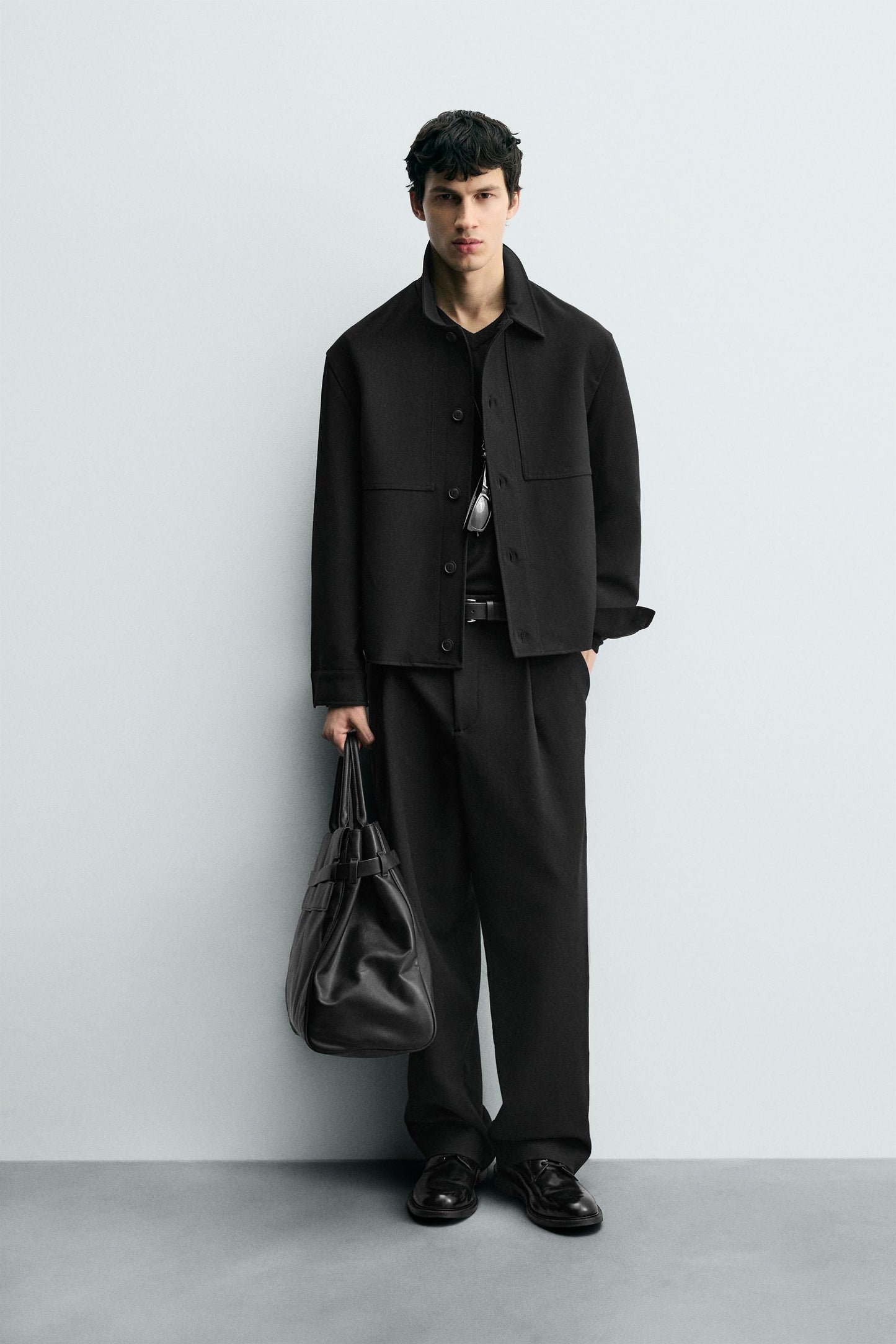 RELAXED FIT PLEATED PANTS