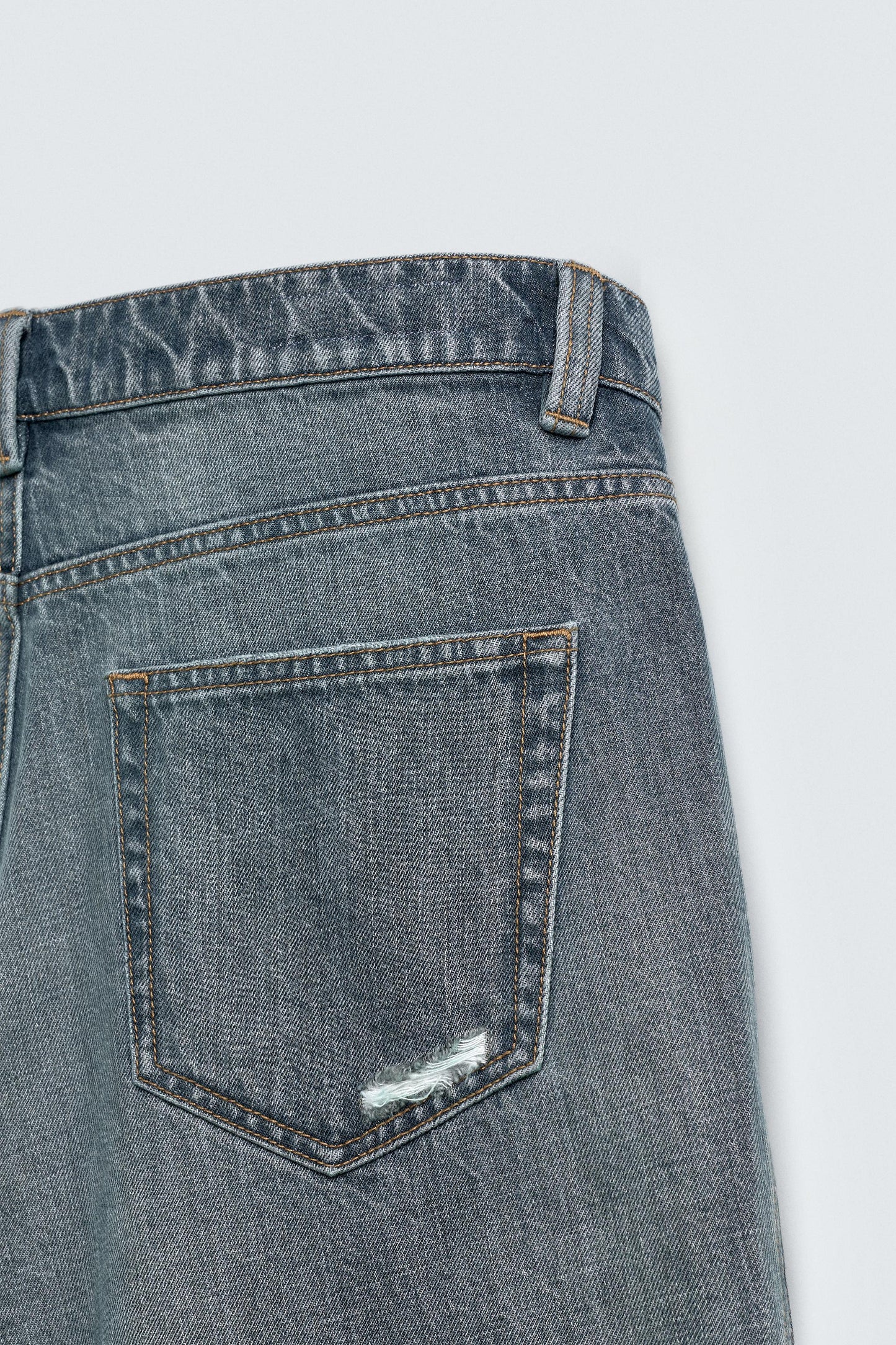 RIPPED DENIM BERMUDA SHORTS