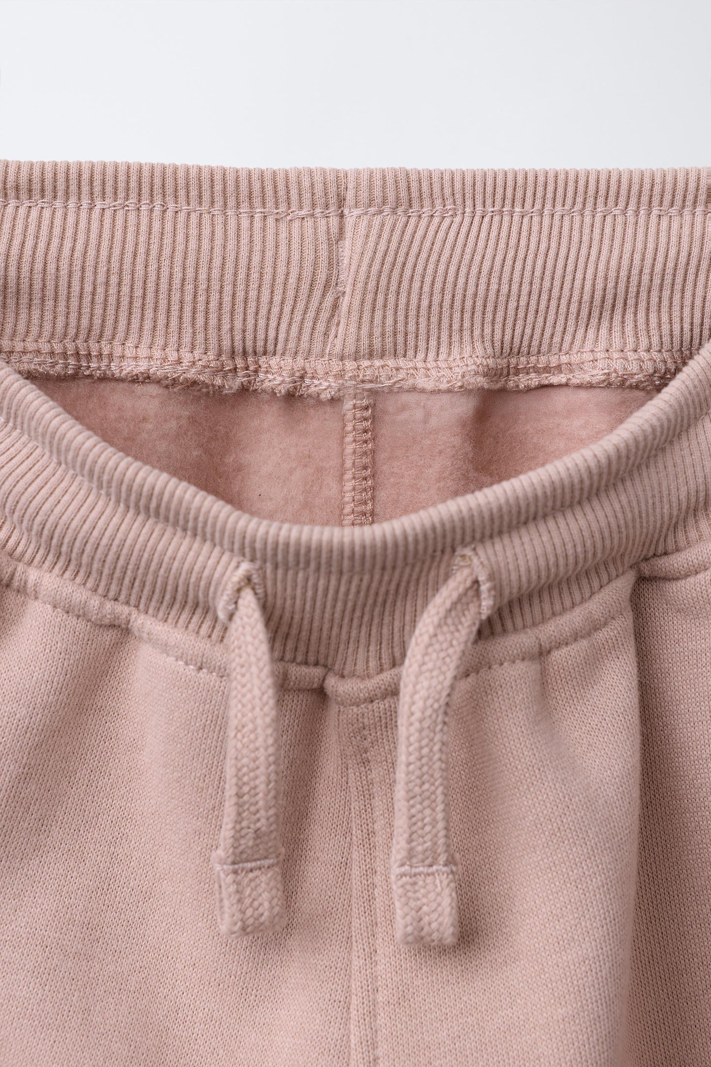 FLOCKED LOGO JOGGER PANTS