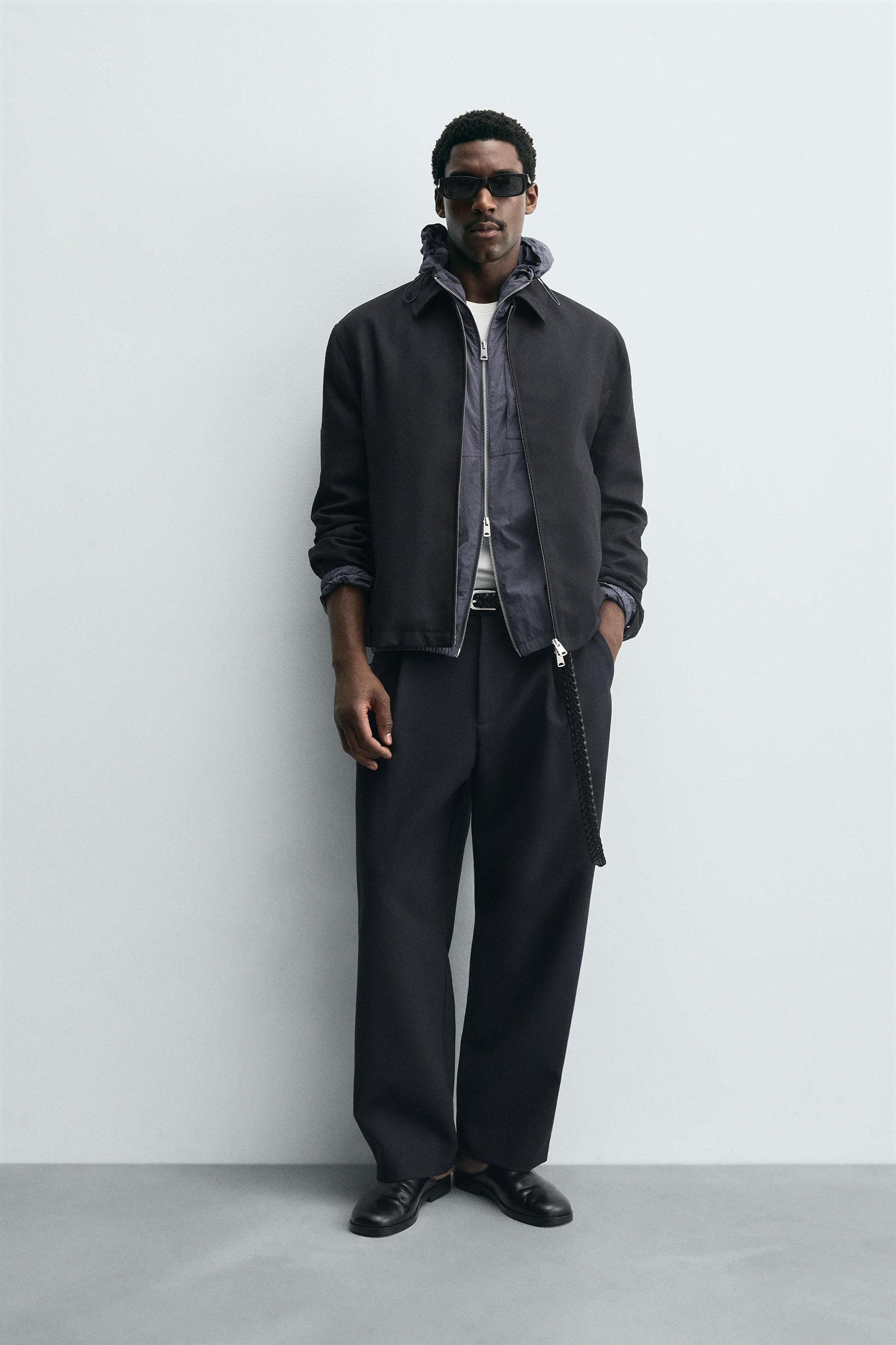 RELAXED FIT PLEATED PANTS