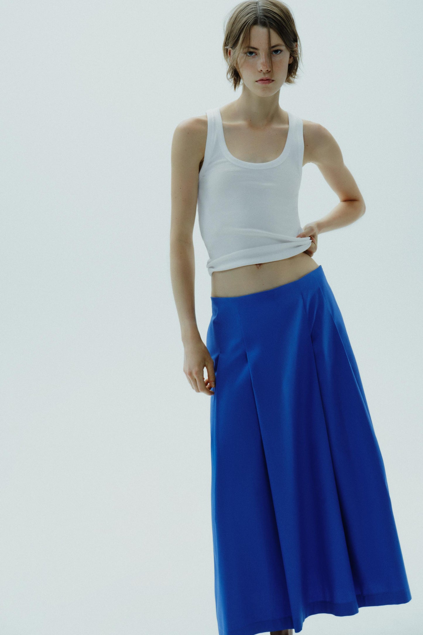 PLEATED MIDI SKIRT