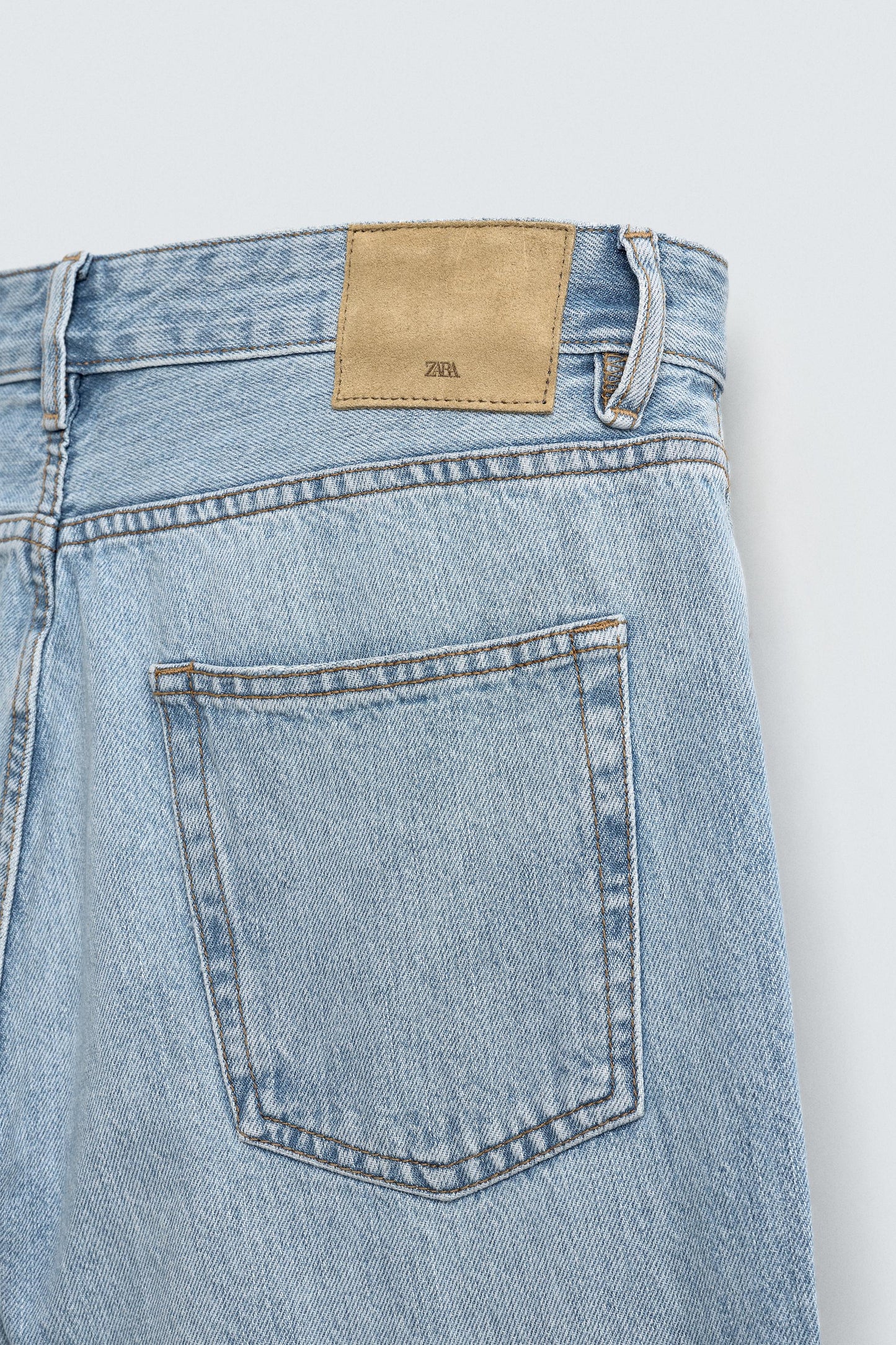 SLIM TAPERED FIT JEANS