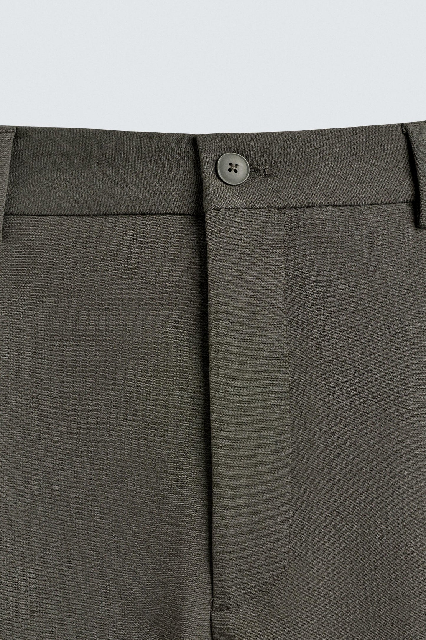 RELAXED FIT PLEATED PANTS