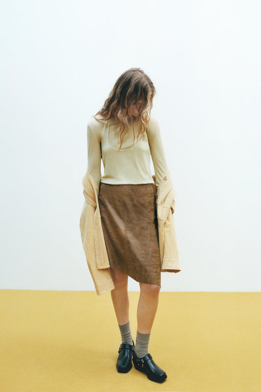 ASYMMETRIC LEATHER MIDI SKIRT