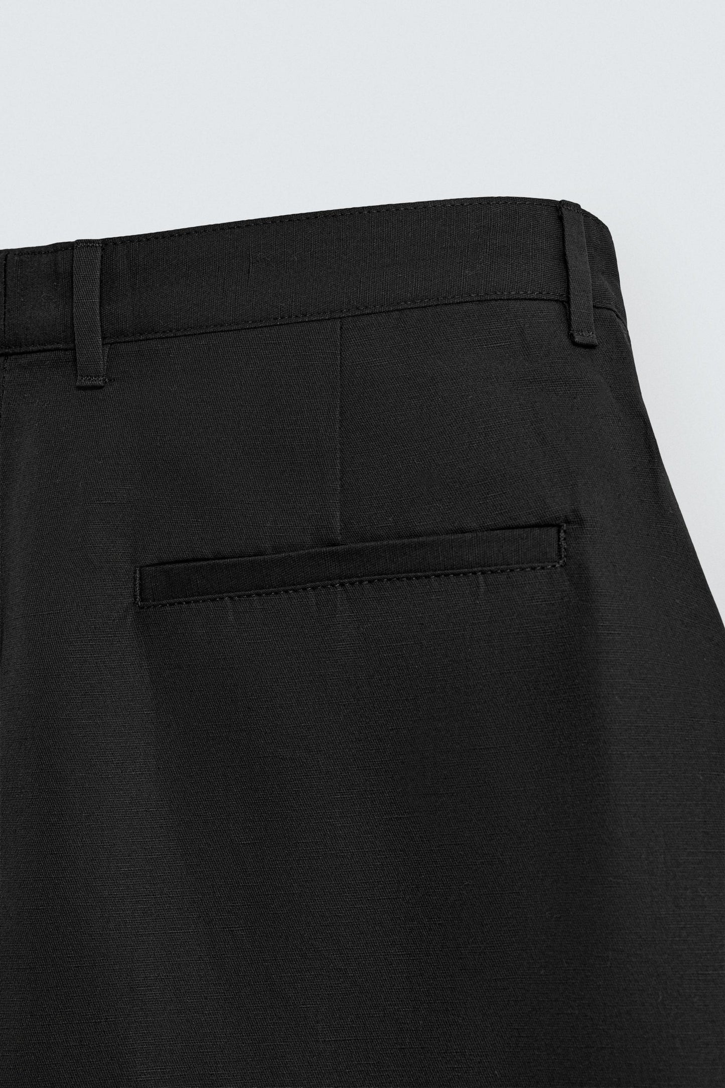 RELAXED FIT PLEATED PANTS