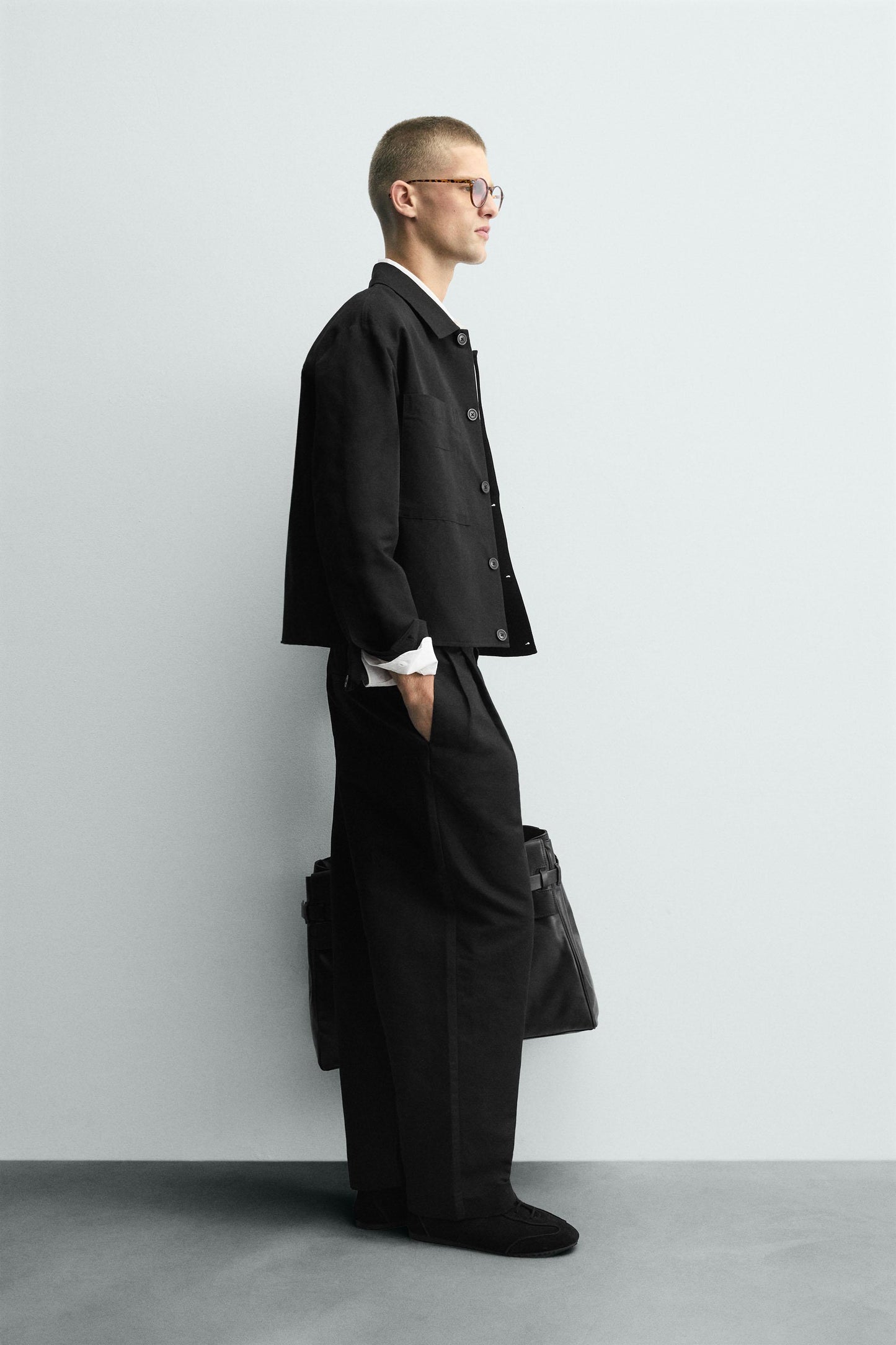 RELAXED FIT PLEATED PANTS